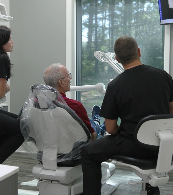 Confident smile from a dentistry patient treated by Drs. Chad and Alecia Moore.