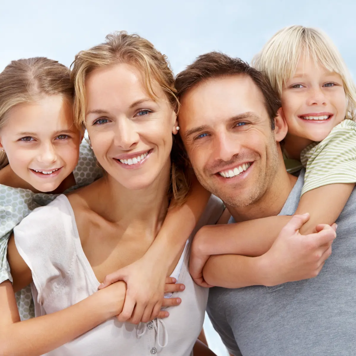 Image of family smiling.